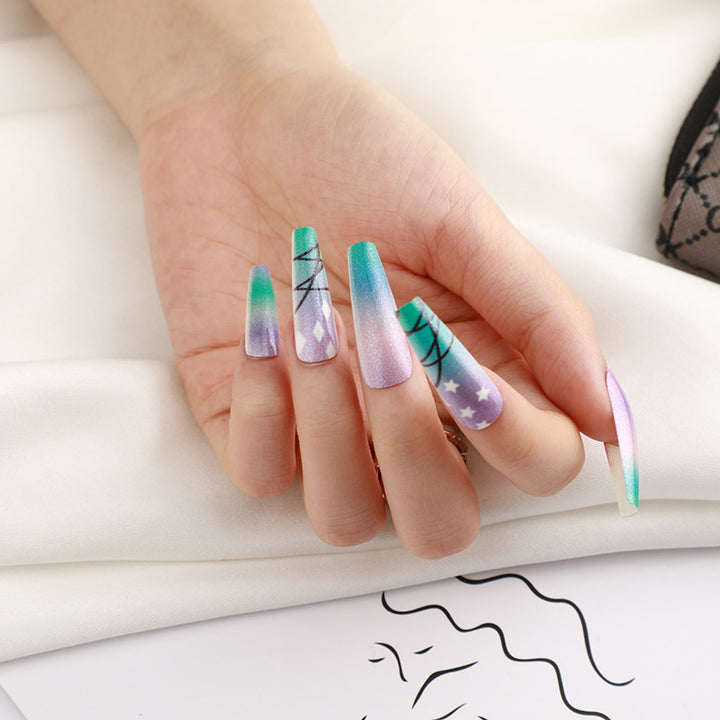 Artificial nails with star and moon design Bowlift