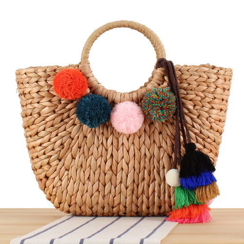 Basket bag with colorful pompons and carrying straps Bowlift