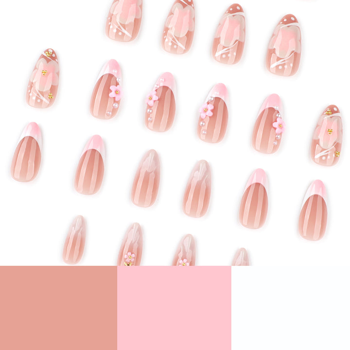 Artful nail extensions with floral patterns and glitter accents Bowlift