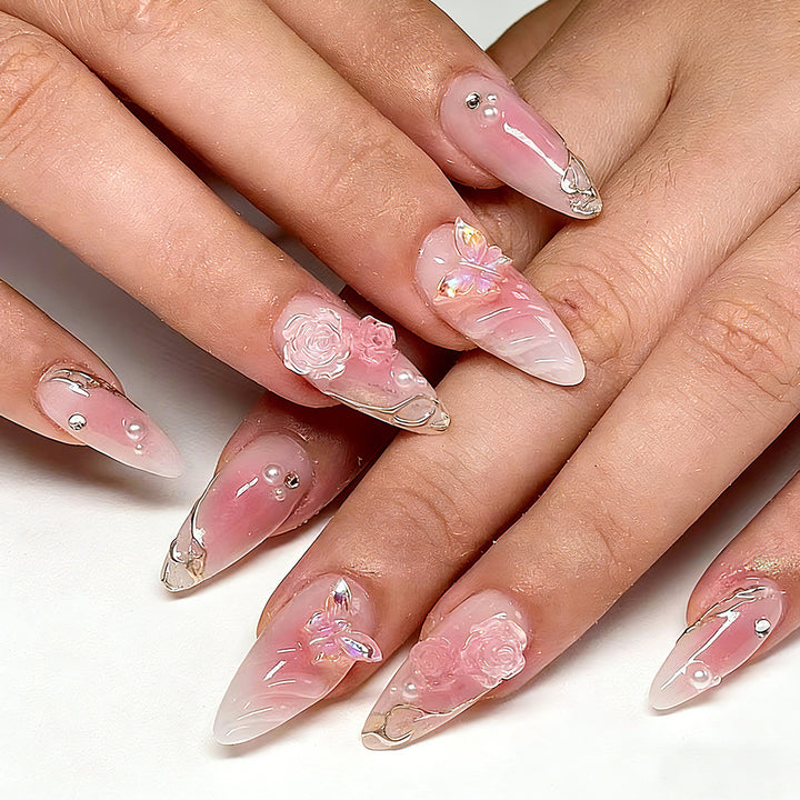 Artificial nails with delicate rose design and glitter accents Bowlift