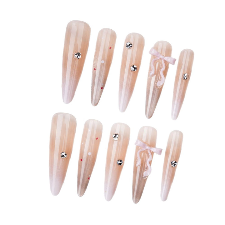 Elegant Stiletto Press-On Nail Set with Decorative Accents Bowlift