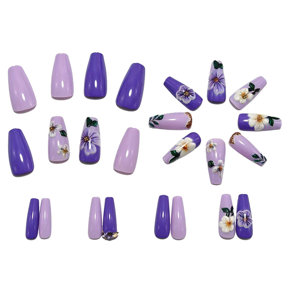 Artificial nails with floral embellishments and elegant high gloss Bowlift