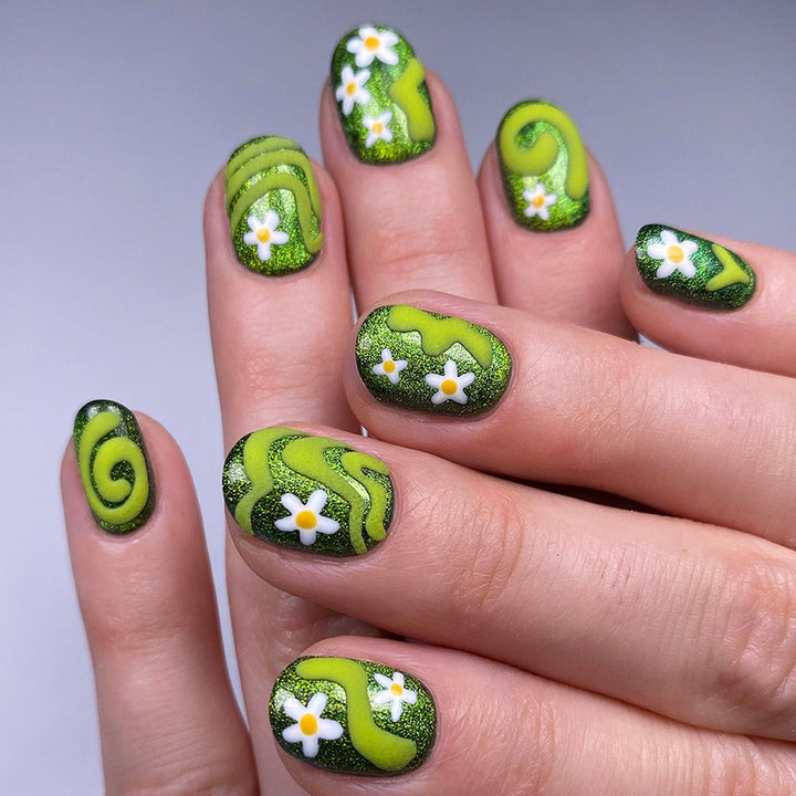 Artificial nails with floral and glittering accents Bowlift