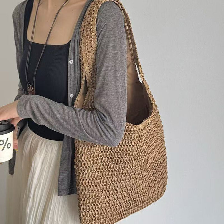 Shoulder bag made of robust woven natural material Bowlift