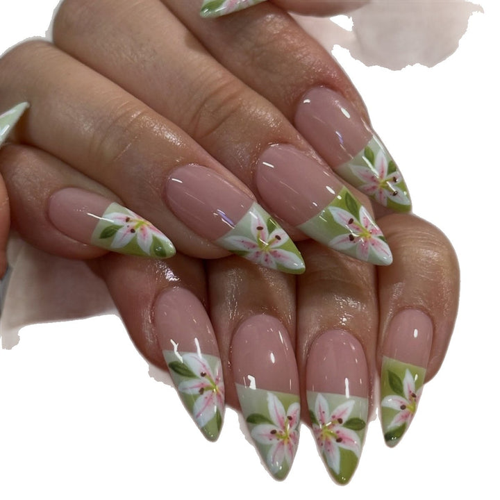 Artificial nails with hand-crafted floral embellishments Bowlift