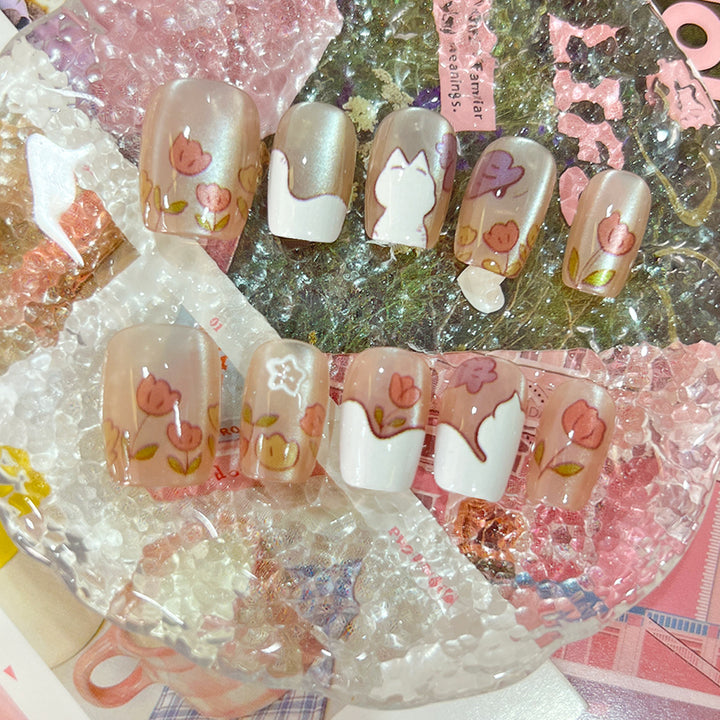 Artistic nail tips with floral motifs Bowlift