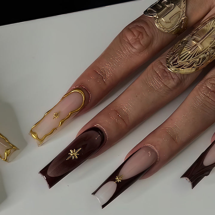 Artistic Sculpted Press-On Nails with Gold Accents Bowlift