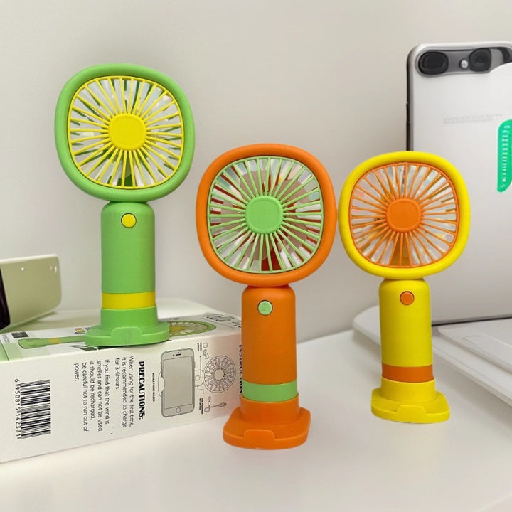 Unisex Handheld Fan with ergonomic design and practical stand function Bowlift