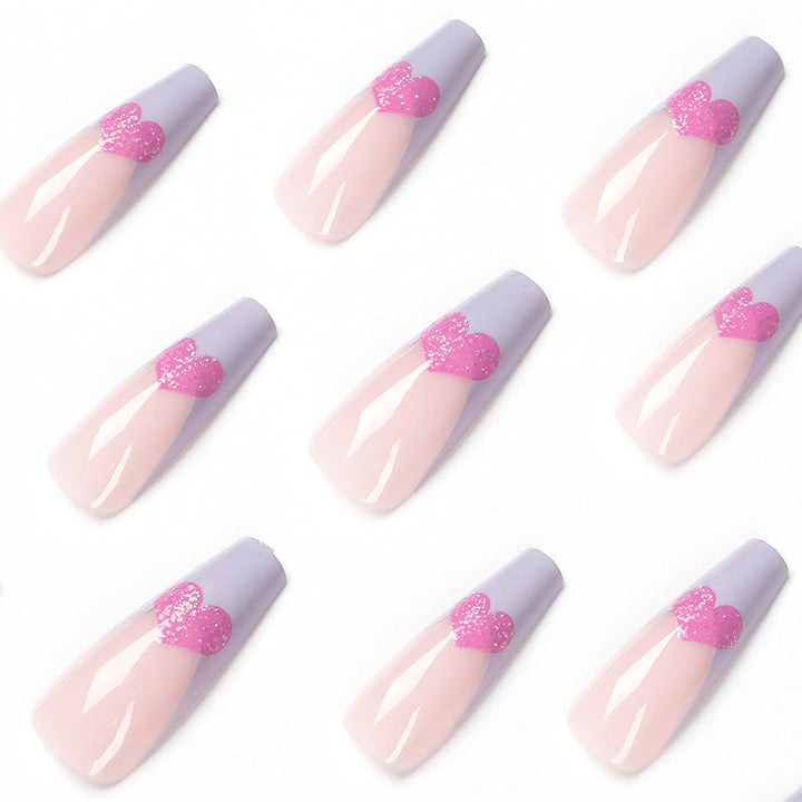 Artful stiletto nails with colorful heart designs Bowlift
