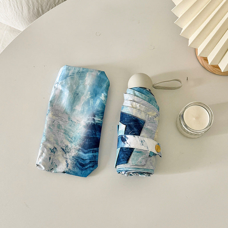 Ladies elegant folding umbrella with unique marble pattern Bowlift