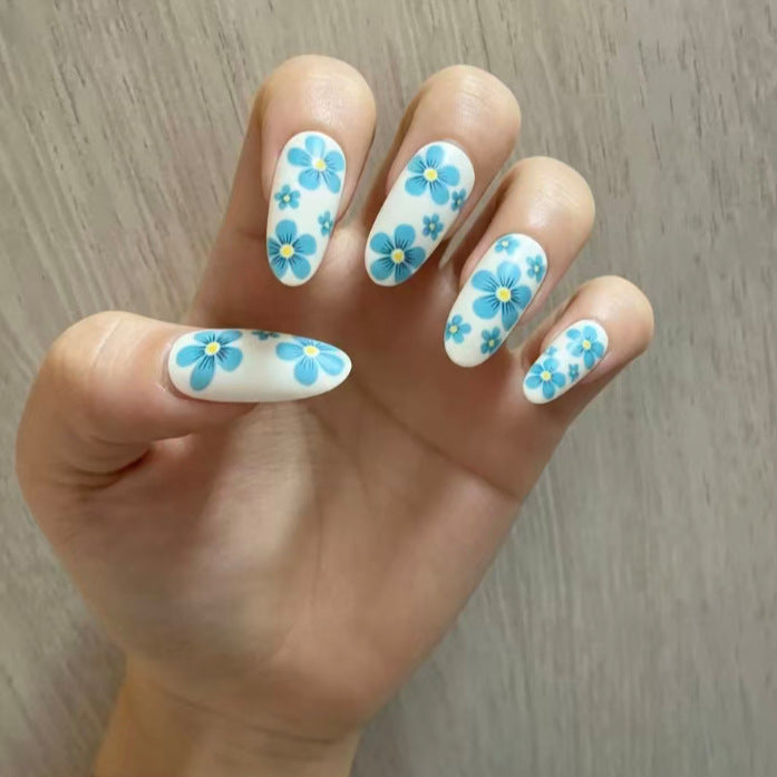 Artistic Almond-Shaped Press-On Nails Set with Metallic Accents Bowlift