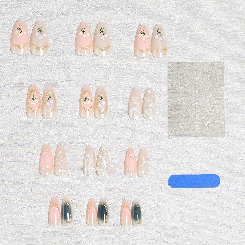 Nail art set with filigree floral decorations Bowlift