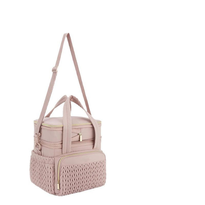 Insulated picnic bag with multi-layered interior compartment and practical carrying system Bowlift