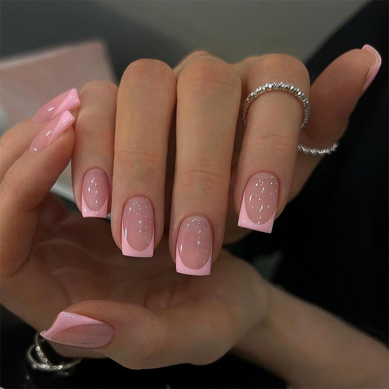 Artificial nail set with elegant French design and sparkling accents Bowlift