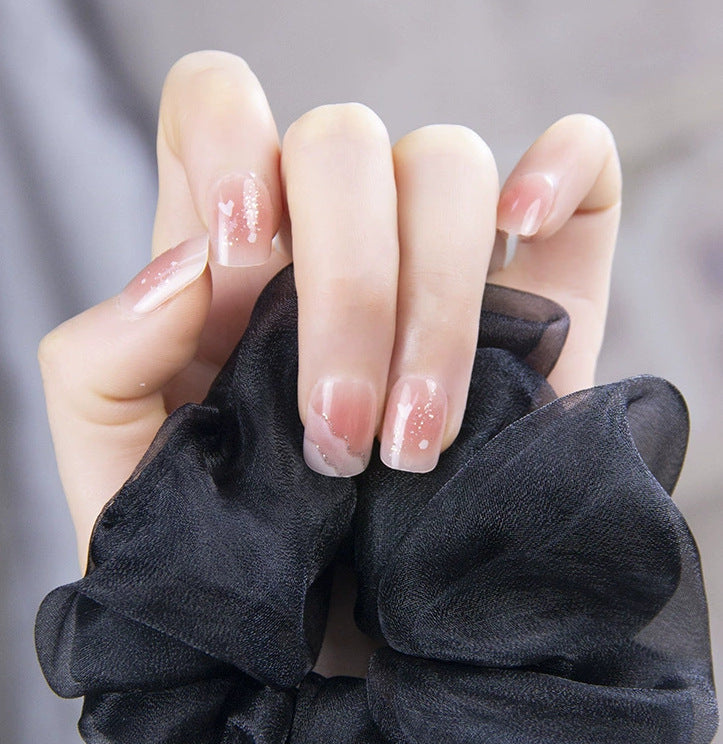 Elegant nail design with pearl embellishment Bowlift