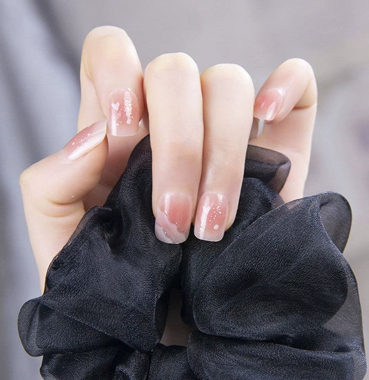 Elegant nail design with pearl embellishment Bowlift