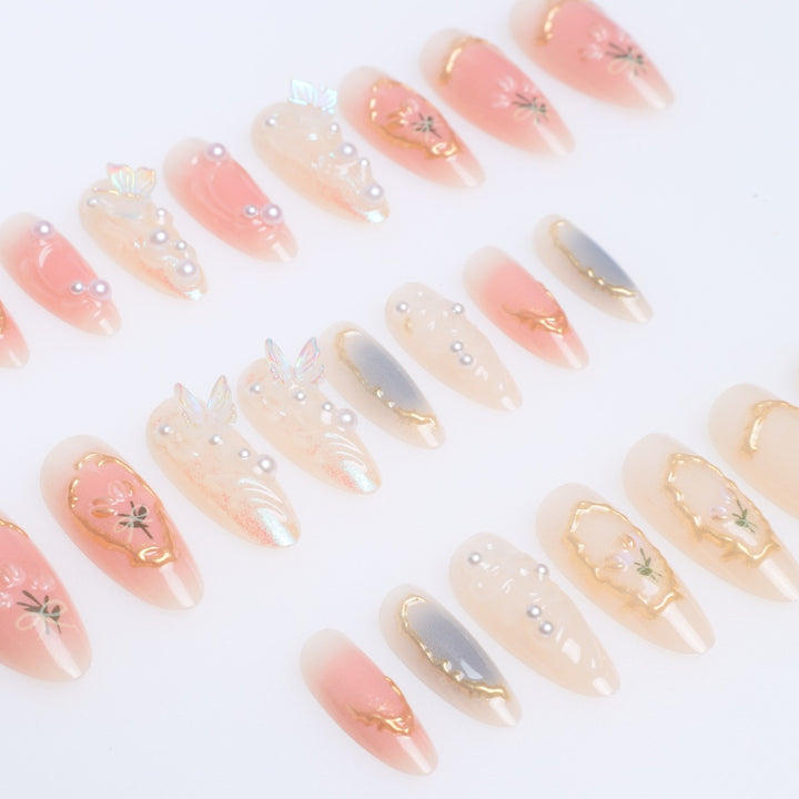 Elegant Stiletto Nail Art Extensions with Floral Embellishments Bowlift