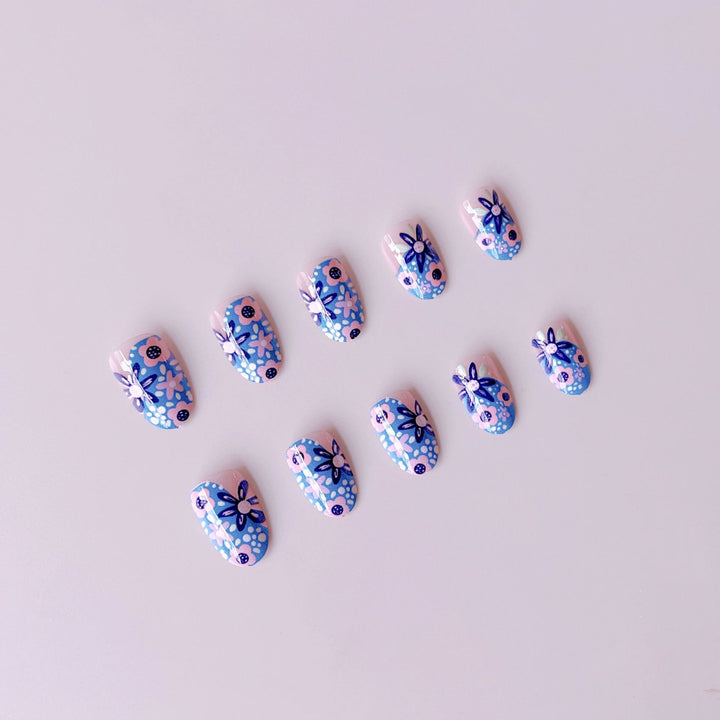 Nail art set with floral accents and vibrant patterns Bowlift