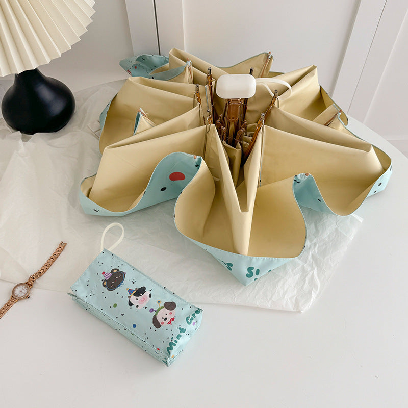 Women's compact umbrella with elegant leaf design Bowlift