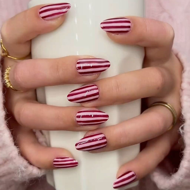 Artistic nail art with striped design Bowlift
