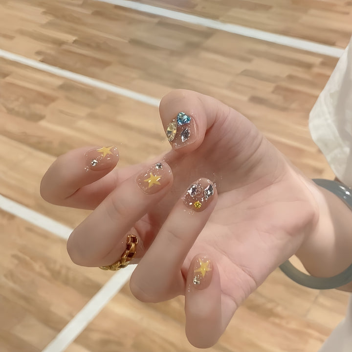 Glittering nail tips with elegant jewelry accents Bowlift