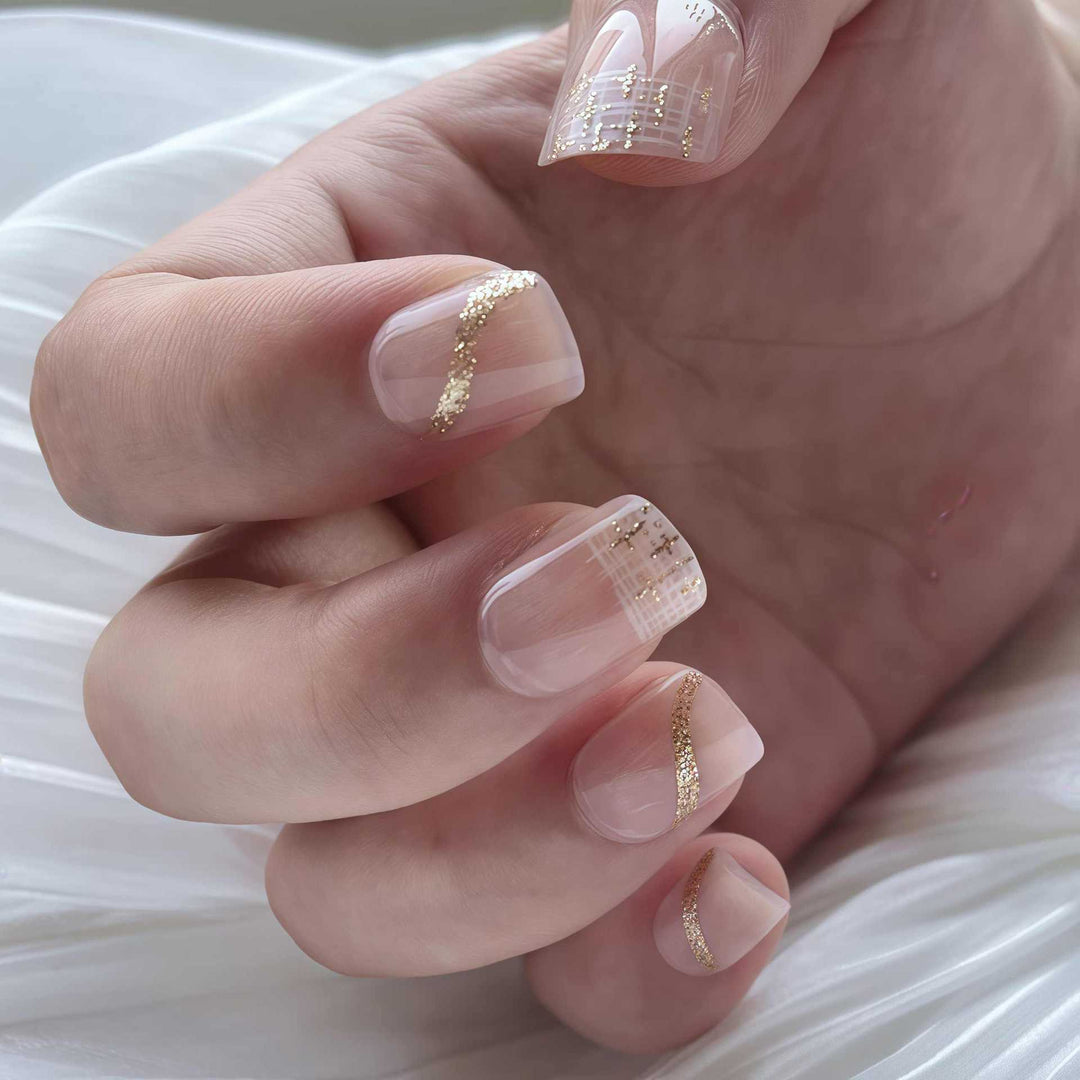 Elegant Press-On Nail Set with Gold Accent and Glitter Design Bowlift
