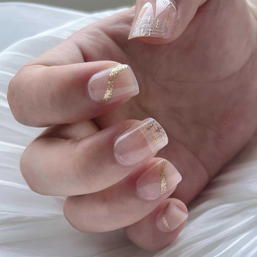 Elegant Press-On Nail Set with Gold Accent and Glitter Design Bowlift