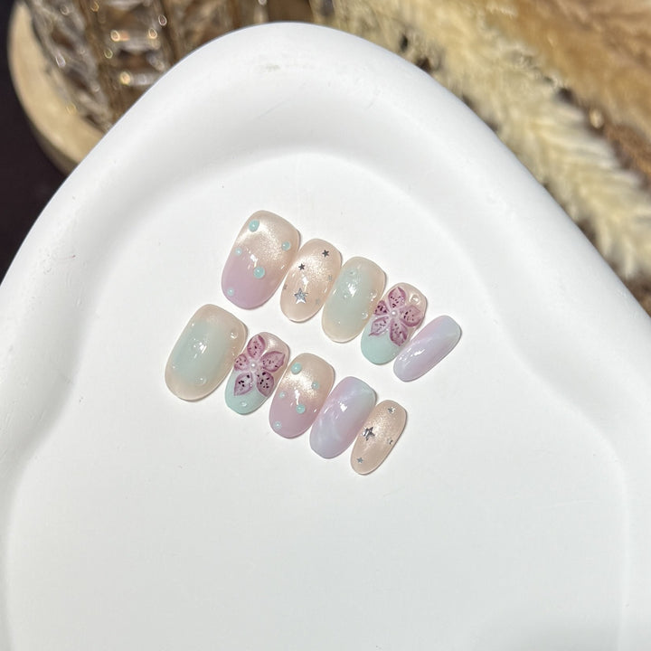 Floral-Inspired Press-On Nail Art Set with Star Accents Bowlift
