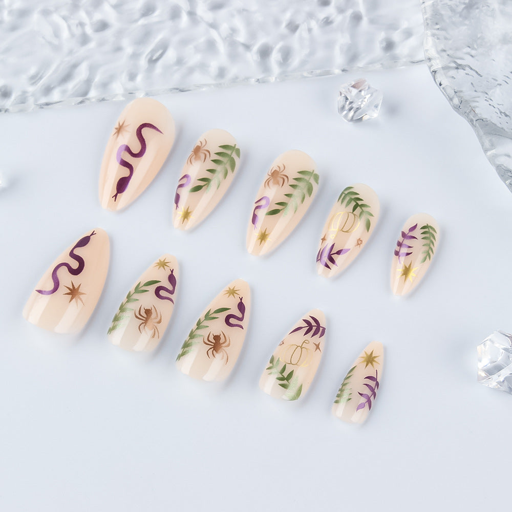 Artistic Press-On Nail Set with Halloween-Inspired Designs Bowlift
