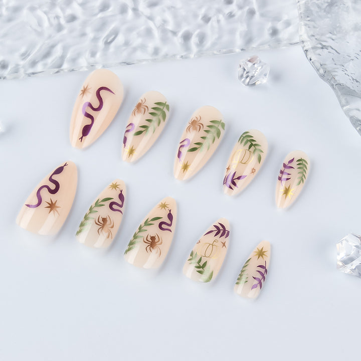 Artistic Press-On Nail Set with Halloween-Inspired Designs Bowlift