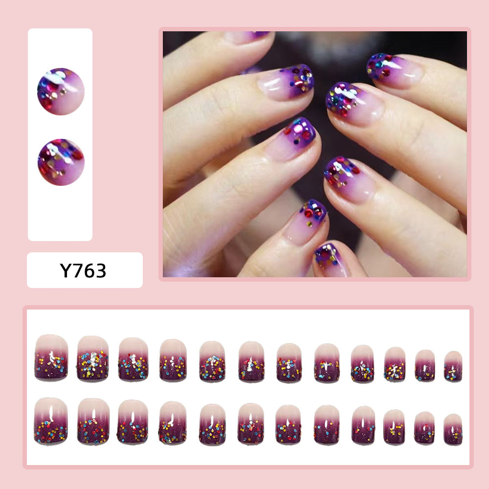 Artificial nails with glitter gradient and colorful accent Bowlift