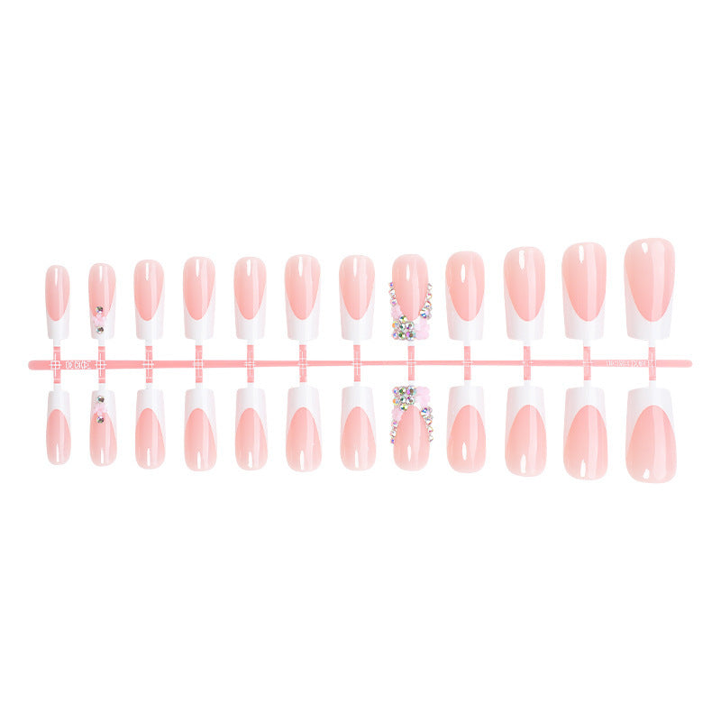 Nail set with elegant flower and glitter decorations Bowlift