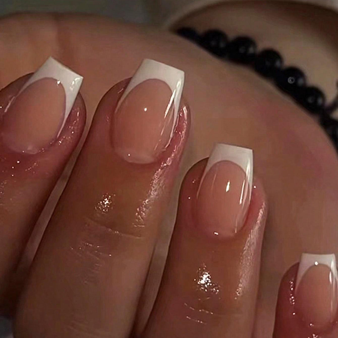 Artificial nails in elegant French style Bowlift