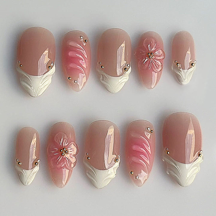 Nail set with luxurious flower and glitter accents Bowlift