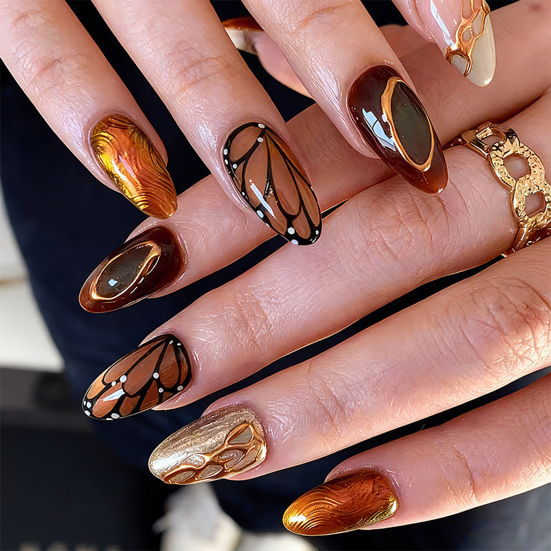 Artificial nail set with elegant gold and black design Bowlift