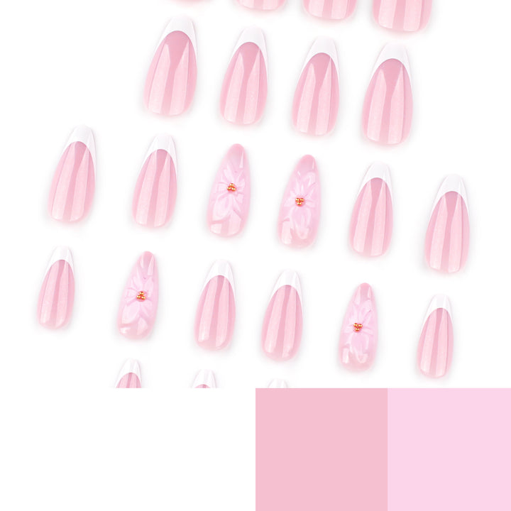 Artistic French-Tip Nail Extensions with Flower Accents Bowlift