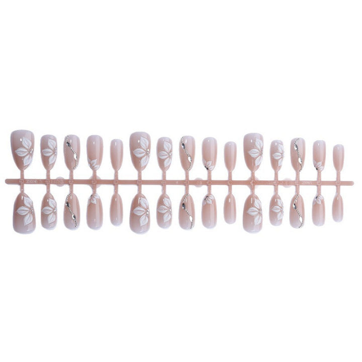 Artificial nail set with elegant flower designs and shimmering accents Bowlift