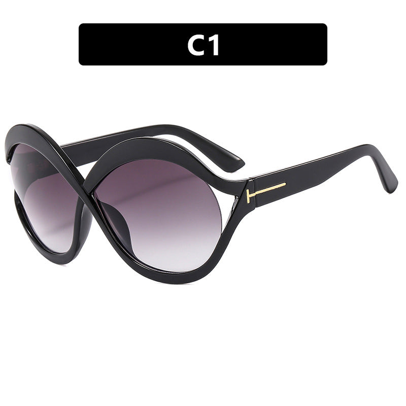 Women's extravagant Cat-Eye sunglasses with curved frame Bowlift