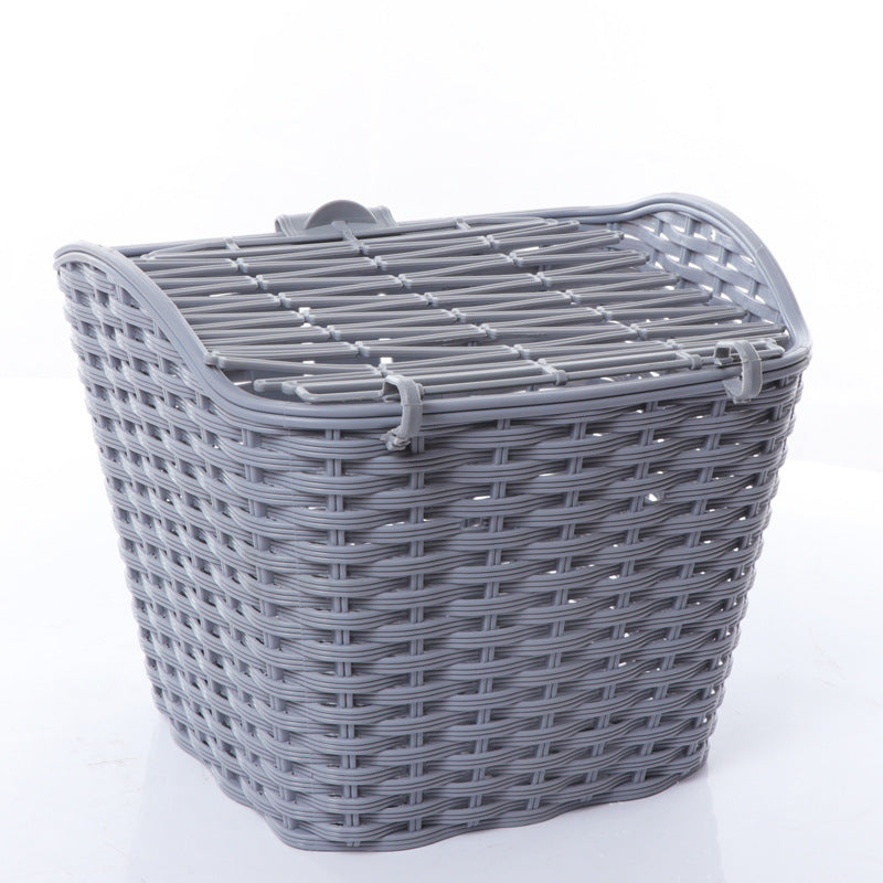 woven front bicycle basket with hinged lid and universal handlebar mount Bowlift