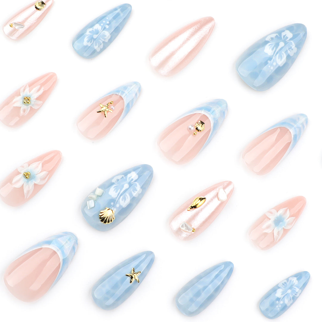 Artful nail extensions with delicate floral designs and glitter accents Bowlift