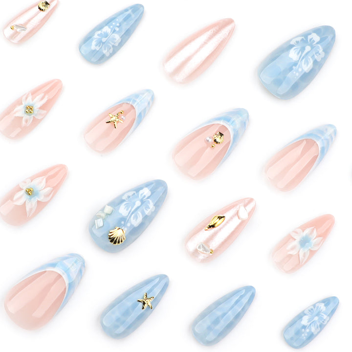 Artful nail extensions with delicate floral designs and glitter accents Bowlift