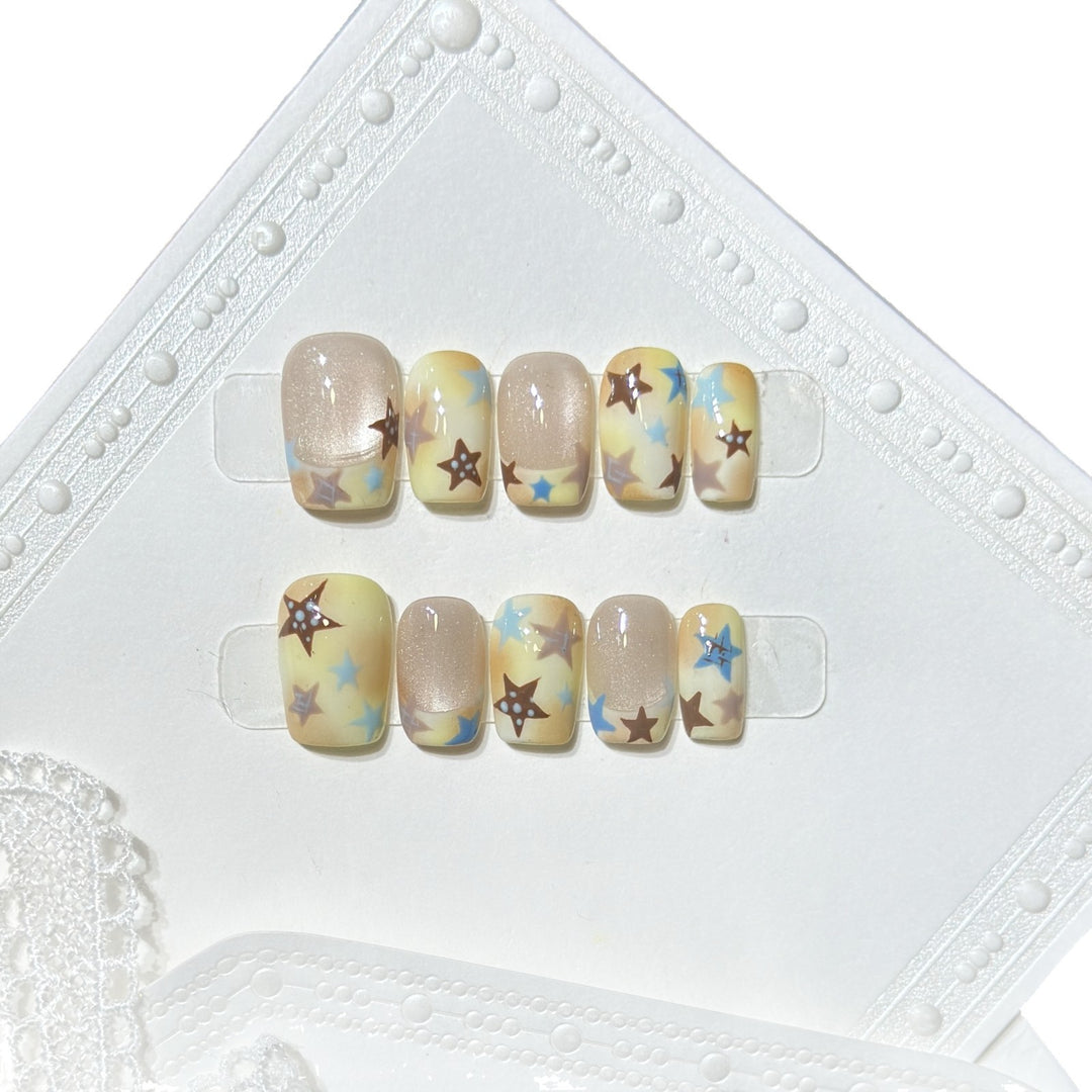 Press-On Nail Art Set with Star Accents Bowlift