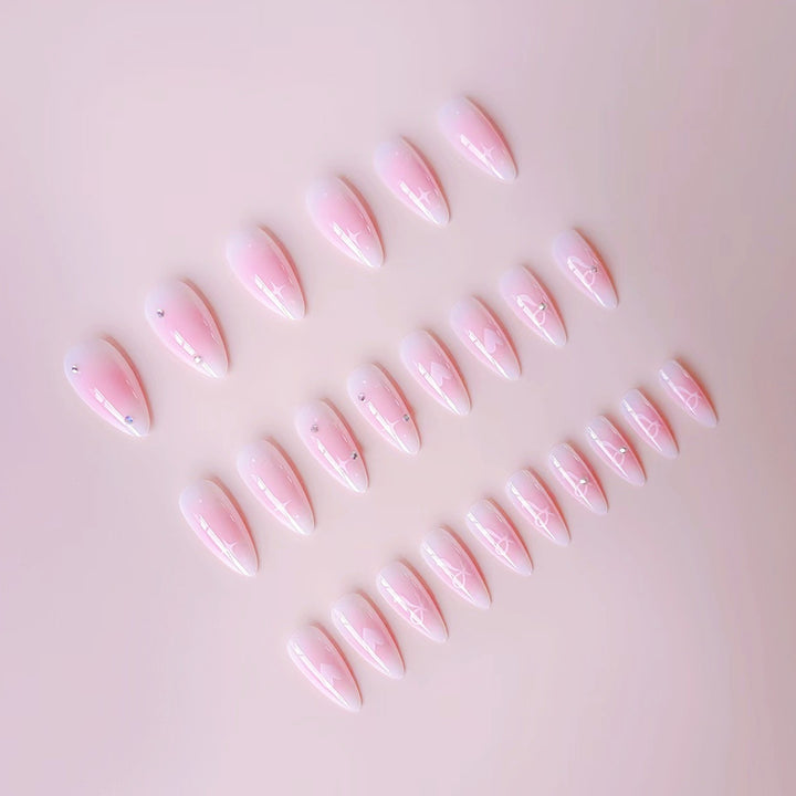 Artificial nail set with romantic heart design and embellished accents Bowlift