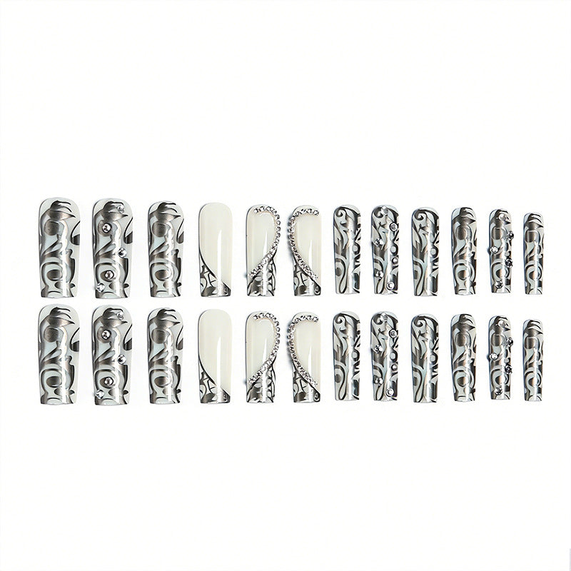 Acrylic nail set with elegant patterns and sparkling accents Bowlift