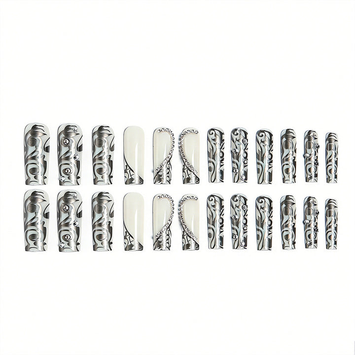 Acrylic nail set with elegant patterns and sparkling accents Bowlift