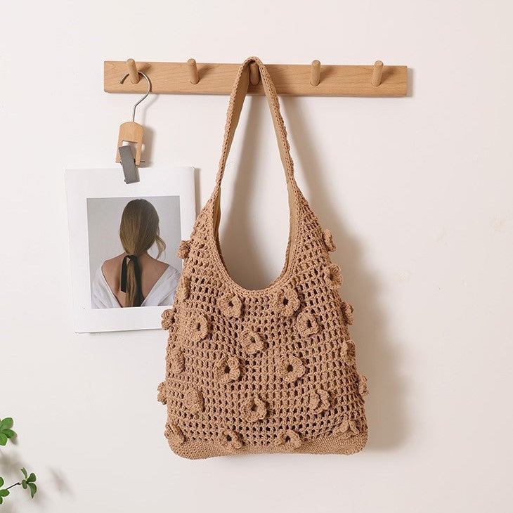 Hand-knotted shoulder bag with floral structural elements Bowlift