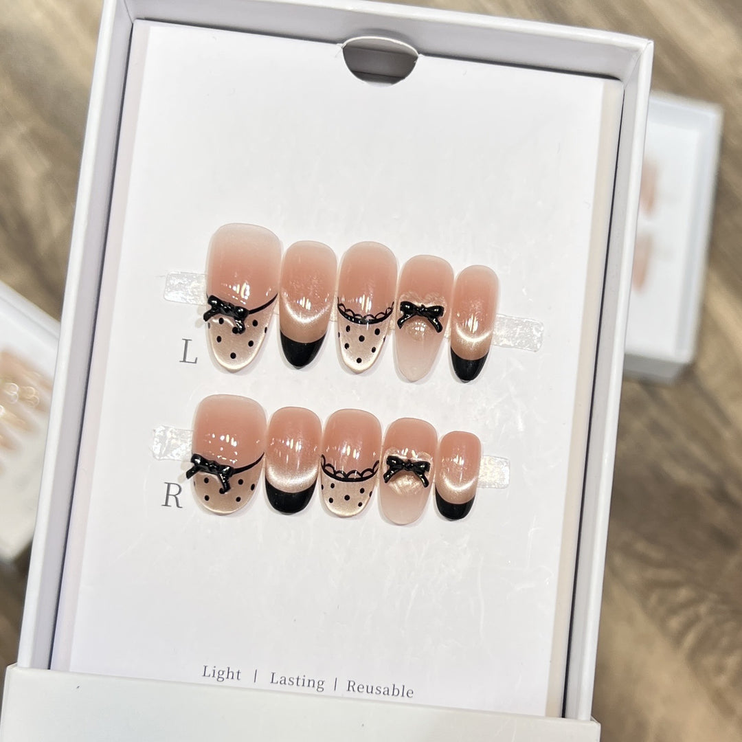 Elegant Reusable Press-On Nail Art Set with Charming Bow Accents Bowlift