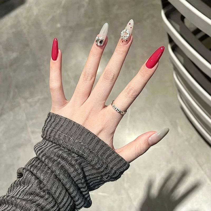 Artificial nail set with sparkling crystal accents and elegant color gradients Bowlift