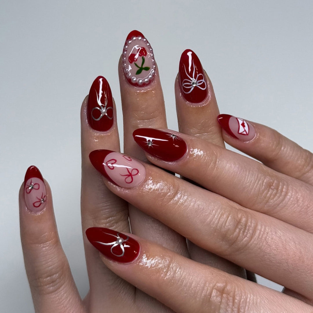 Artful nail designs with bow and rose motif Bowlift