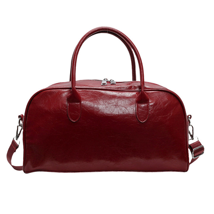 Elegant and Spacious Weekend Bag Made of High-Quality Synthetic Leather Bowlift